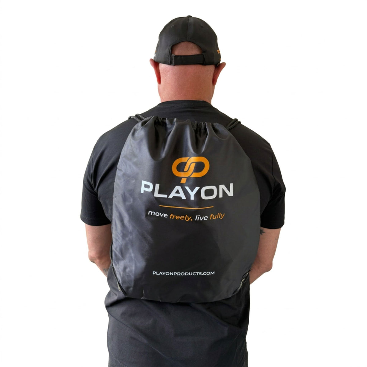 PLAYON drawstring bag with orange PLAYON logo styled by Johnny
